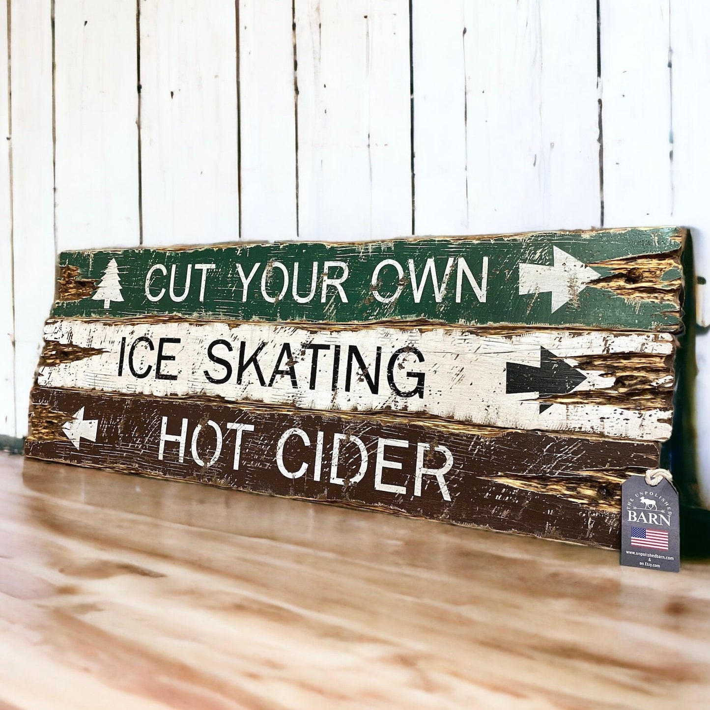 Rustic farmhouse and cabin sign handmade in Maine with distressed wood planks reading “Cut Your Own,” “Ice Skating,” and “Hot Cider,” perfect for cozy lodge decor, winter cabins, and holiday farmhouse style