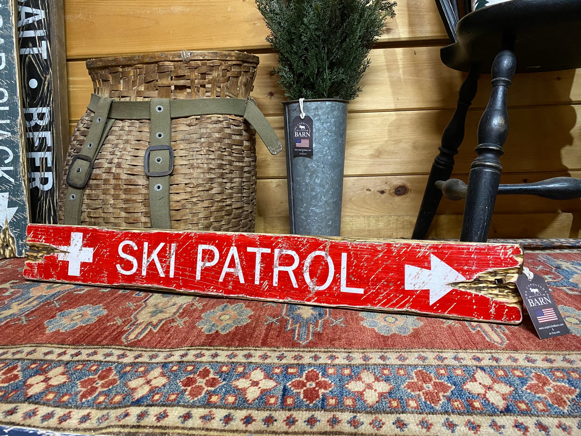Handcrafted red wooden Ski Patrol sign for rustic ski cabin, mountain lodge, or chalet wall décor — vintage distressed ski trail sign with alpine rescue style, handmade in Maine and perfect for ski house decoration, made in Maine.