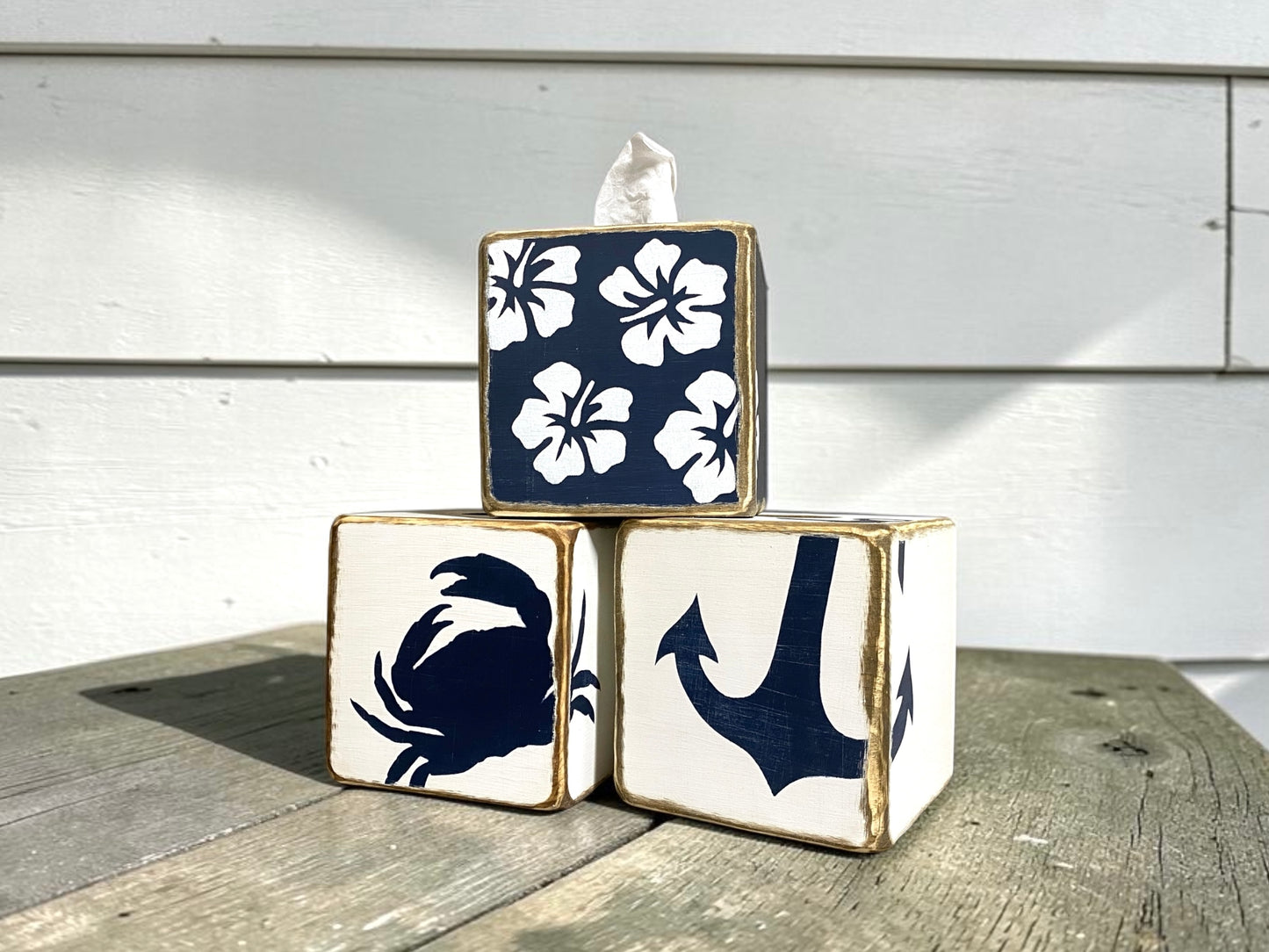 Decorative navy hibiscus tissue box covers showcasing tropical floral designs and coastal beach house decor. Perfect for beach homes, coastal cottages, tropical bathrooms, guest rooms, waterfront retreats, and vacation rentals