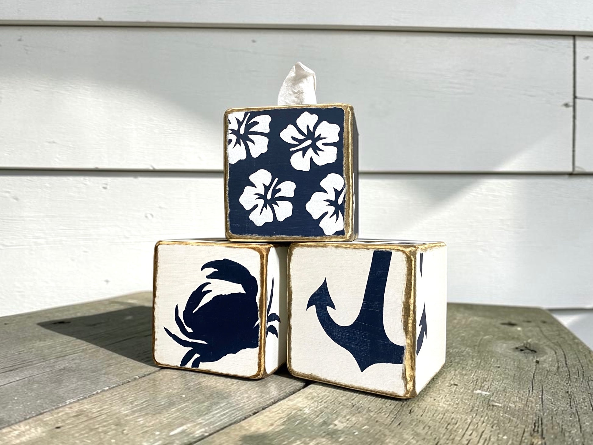 Decorative navy hibiscus tissue box covers showcasing tropical floral designs and coastal beach house decor. Perfect for beach homes, coastal cottages, tropical bathrooms, guest rooms, waterfront retreats, and vacation rentals