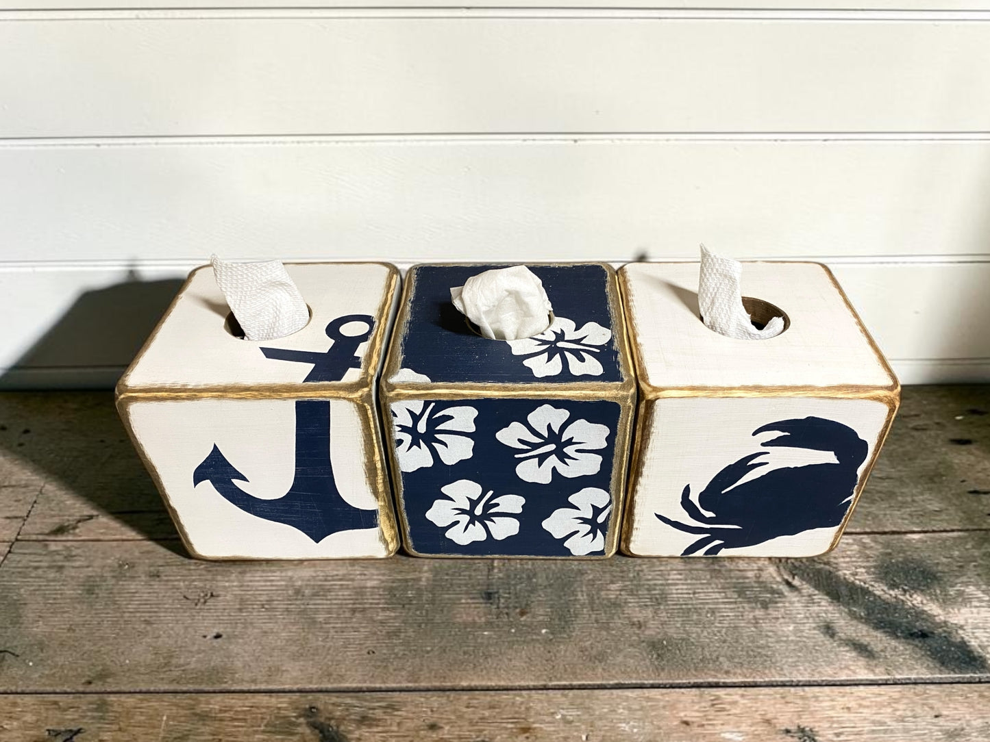 Decorative tropical hibiscus tissue box cover collection featuring navy blue coastal floral designs. Beach house decor for coastal cottages, tropical bathrooms, guest rooms, waterfront homes, vacation rentals, and seaside retreats
