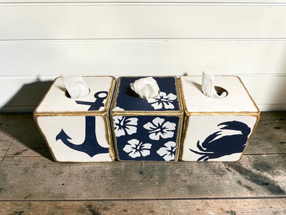 Decorative tropical hibiscus tissue box cover collection featuring navy blue coastal floral designs. Beach house decor for coastal cottages, tropical bathrooms, guest rooms, waterfront homes, vacation rentals, and seaside retreats