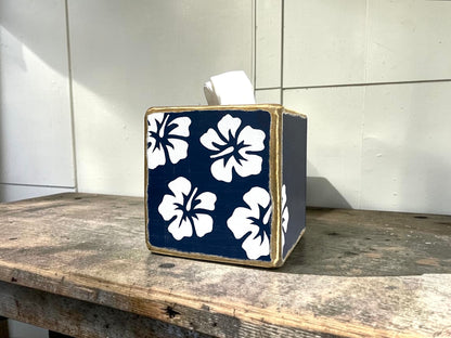Decorative tropical hibiscus tissue box cover featuring a navy blue floral design. Coastal beach house decor for tropical bathrooms, guest rooms, beach cottages, waterfront homes, vacation rentals, and seaside retreats