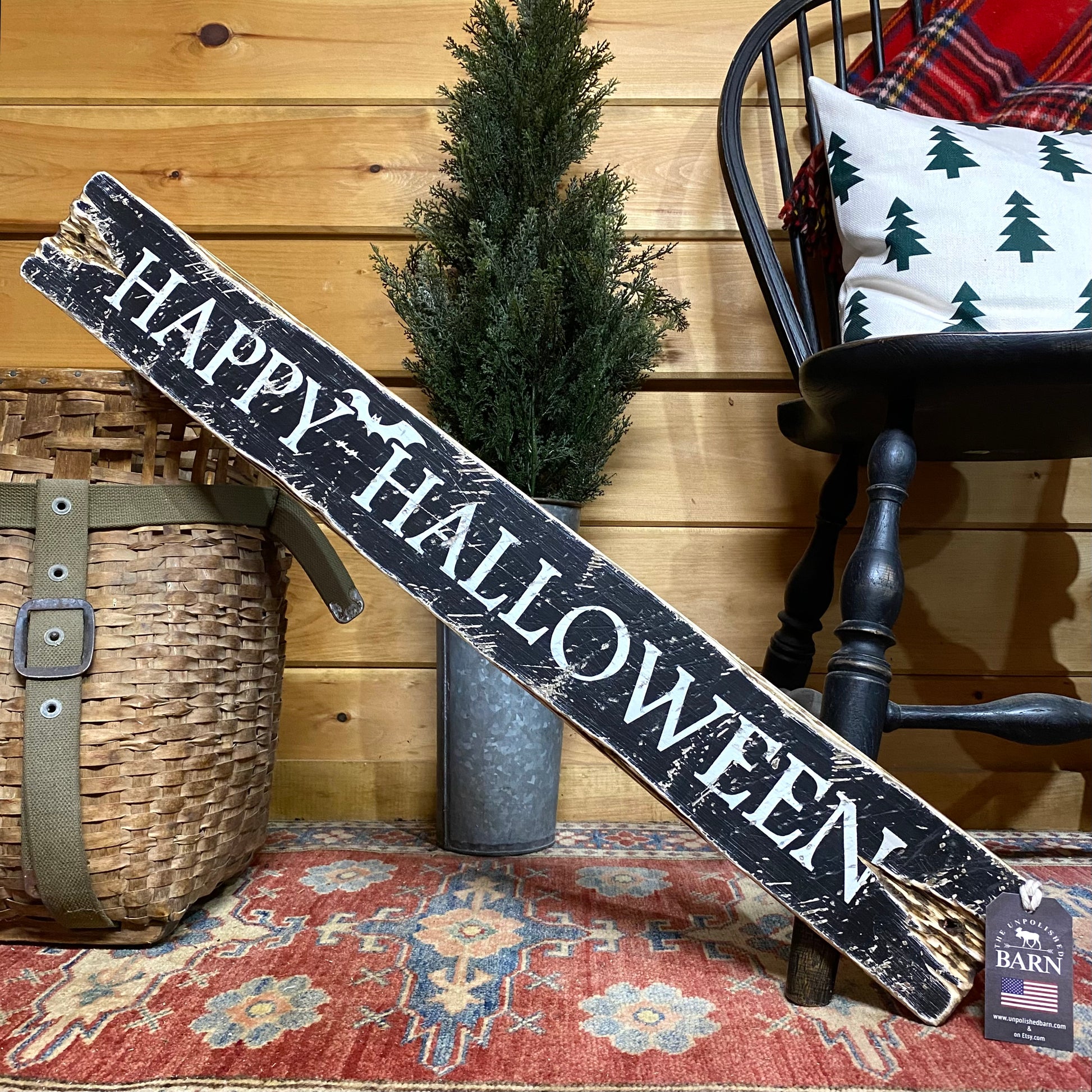 Rustic wooden Happy Halloween sign, distressed for a vintage farmhouse look. Handmade Halloween wall decor by The Unpolished Barn, perfect for spooky fall home decorating