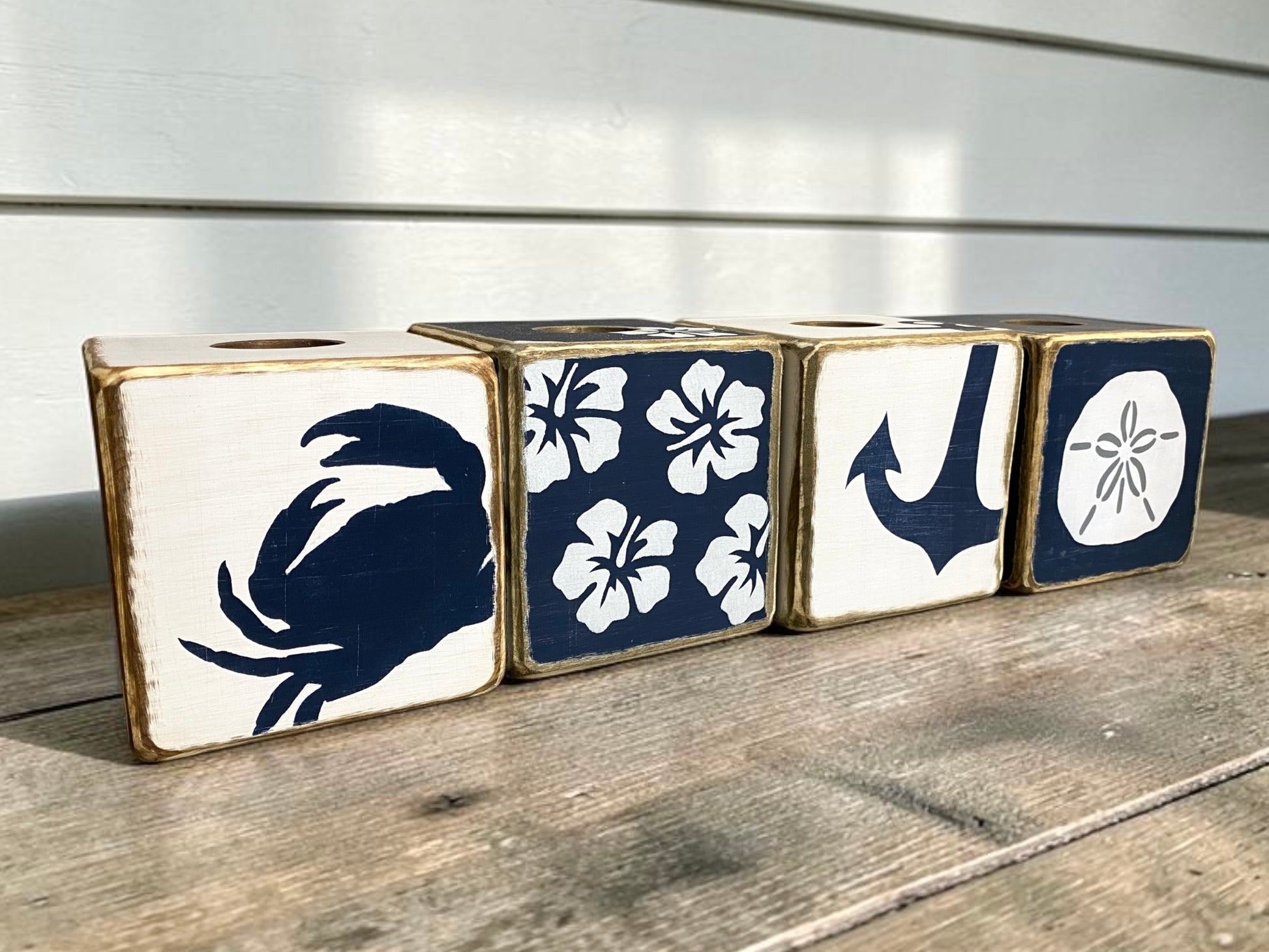 Collection of decorative navy hibiscus tissue box covers featuring tropical coastal decor style. Beach house accents for bathrooms, guest rooms, seaside cottages, and island-inspired homes