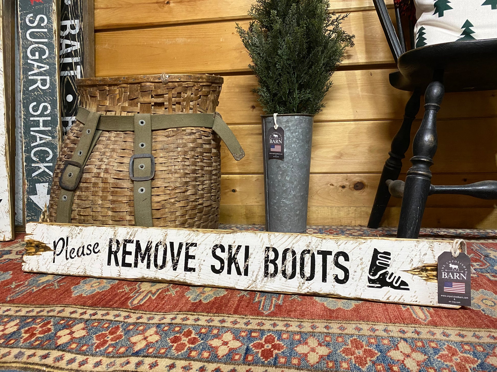 Handcrafted white wooden “Please Remove Ski Boots” sign with vintage ski boot design, rustic wall décor for ski lodge, mountain chalet, or winter cabin entryway — handmade in Maine ski house decoration with retro alpine charm, made in Maine