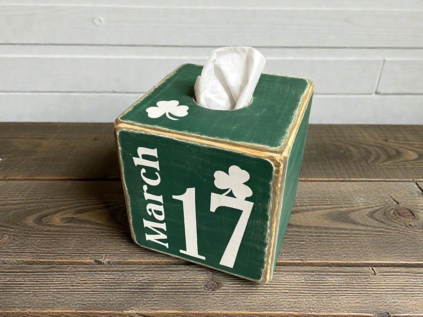 Top-down view of green St. Patrick’s Day tissue box cover with March 17 lettering, showcasing hand-distressed wood finish, rustic Irish décor for cabins, lodges, farmhouse, or country homes, festive holiday accent, made in Maine