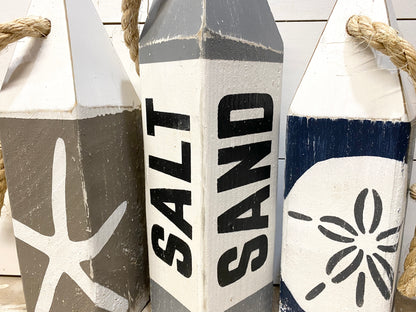 Salt Sand Beach House Wood Buoy Set, Sandollar Starfish