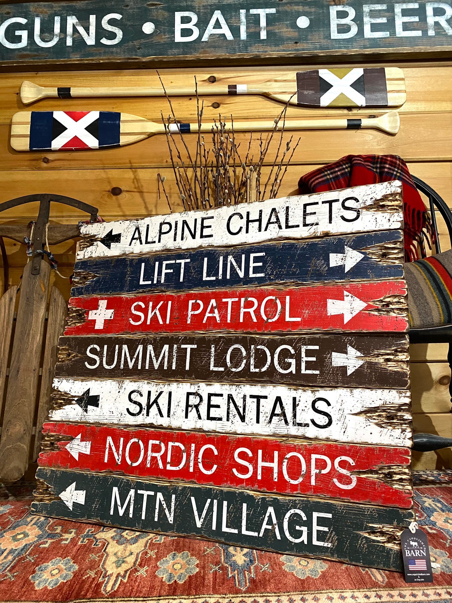“Handmade ski lodge directional wood sign décor, rustic alpine cabin wall art with vintage ski trail names, handcrafted in Maine.”
