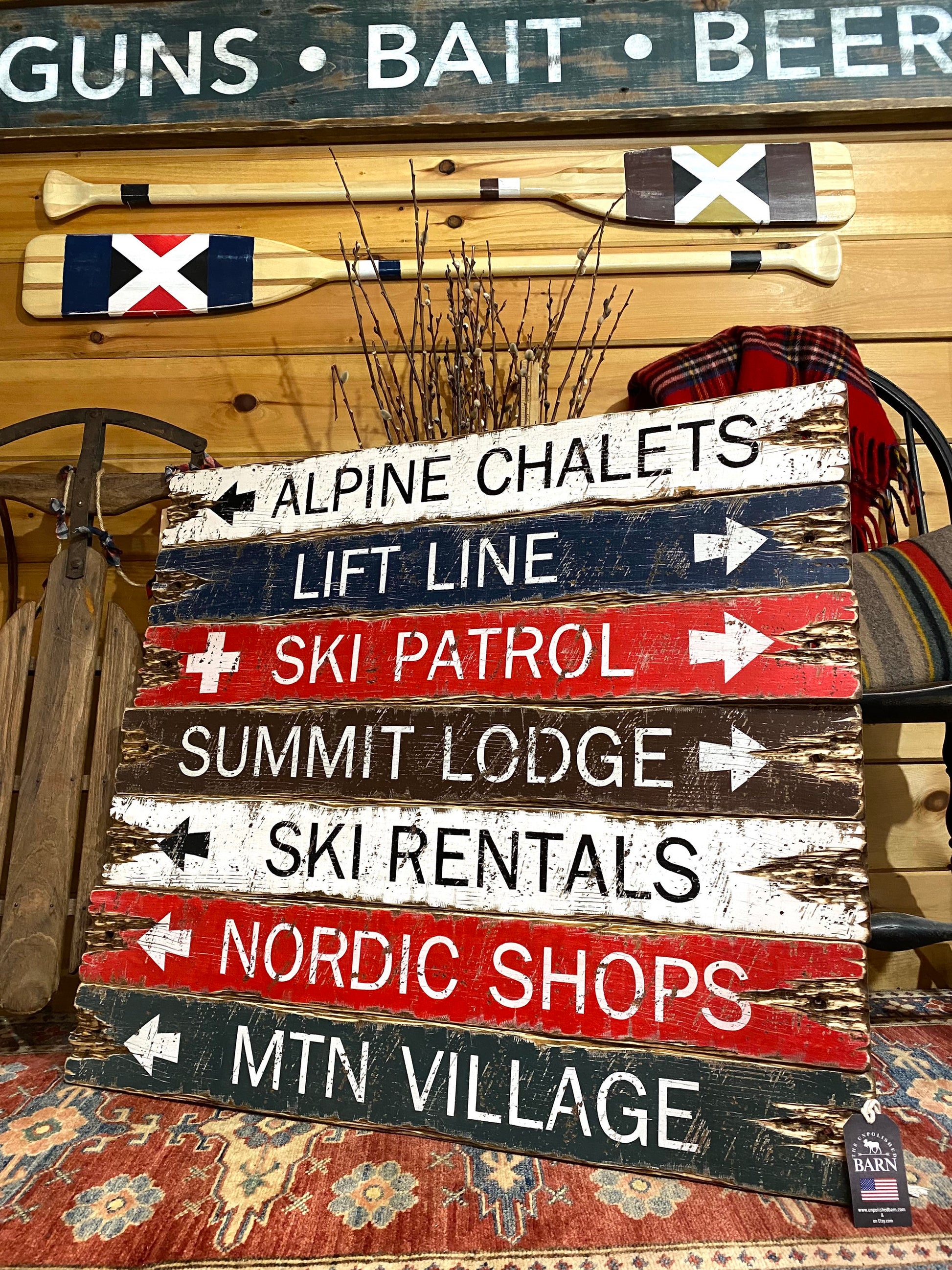 “Handmade ski lodge directional wood sign décor, rustic alpine cabin wall art with vintage ski trail names, handcrafted in Maine.”