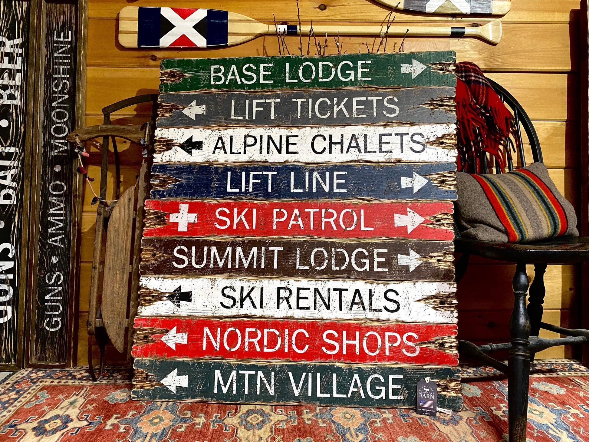 Rustic ski lodge sign handmade in Maine featuring distressed arrows for base lodge, ski rentals, and alpine chalets — perfect cabin and lodge wall décor for winter homes.