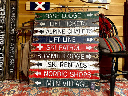 Rustic ski lodge sign handmade in Maine featuring distressed arrows for base lodge, ski rentals, and alpine chalets — perfect cabin and lodge wall décor for winter homes.