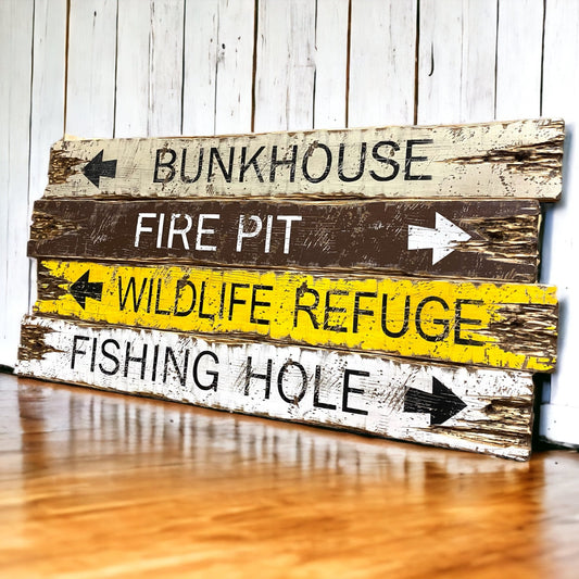 Hand-painted rustic cabin and lodge sign with “Bunkhouse, Fire Pit, Wildlife Refuge, Fishing Hole” — vintage camp wall art and outdoor retreat décor, handmade in Maine