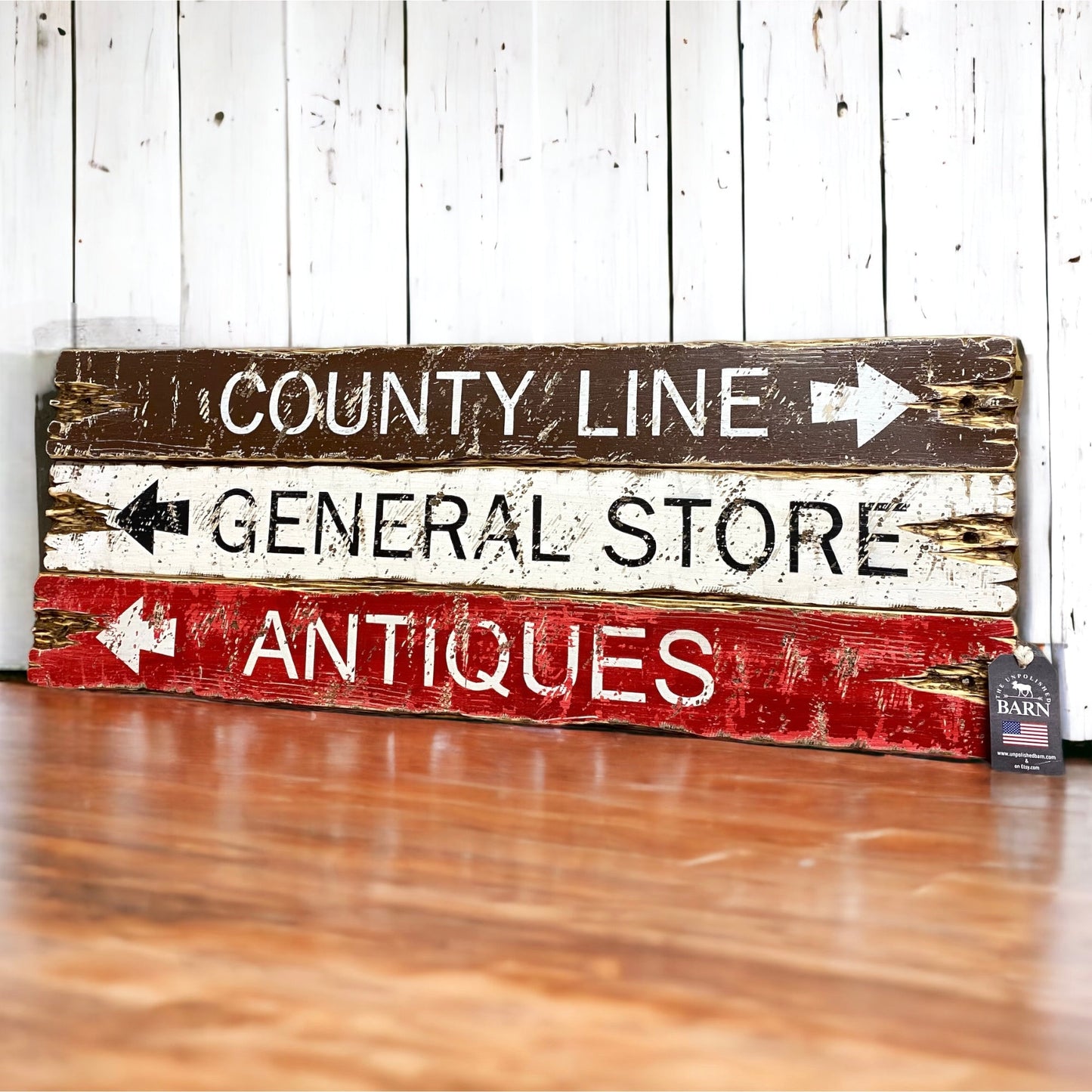 Rustic directional wood sign set reading “County Line,” “General Store,” and “Antiques,” in distressed brown, cream, and red paint, handcrafted farmhouse wall decor handmade in Maine by The Unpolished Barn LLC.